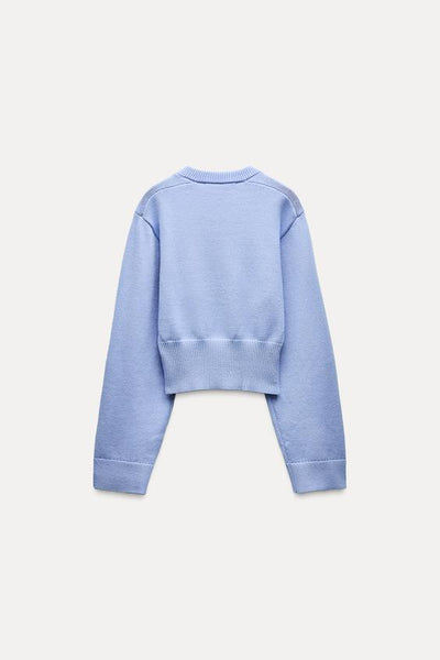 Pull court en tricot à manches larges