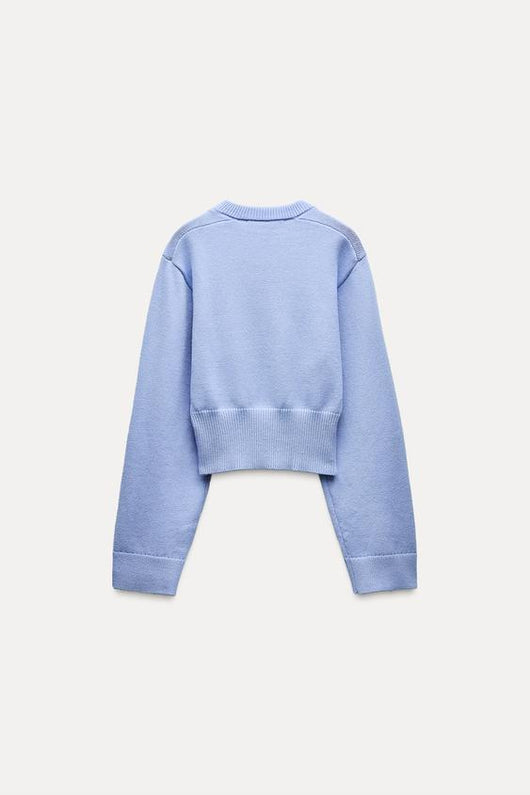 Pull court en tricot à manches larges