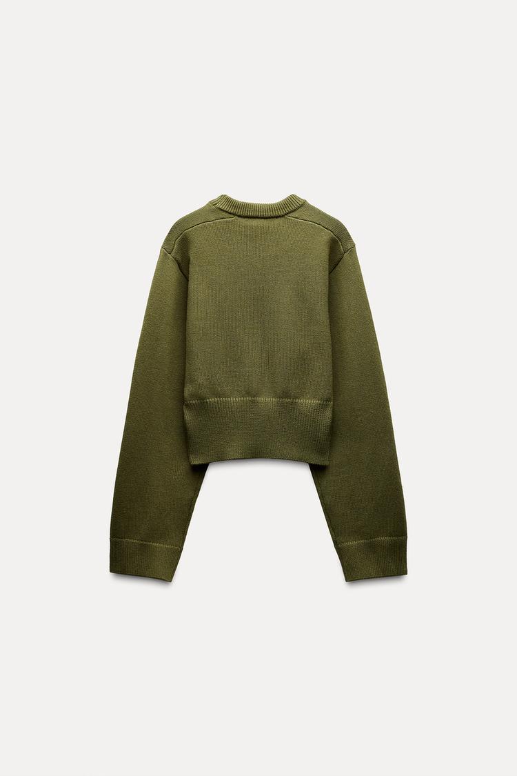 Pull court en tricot à manches larges