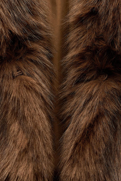 Veste courte en fausse fourrure