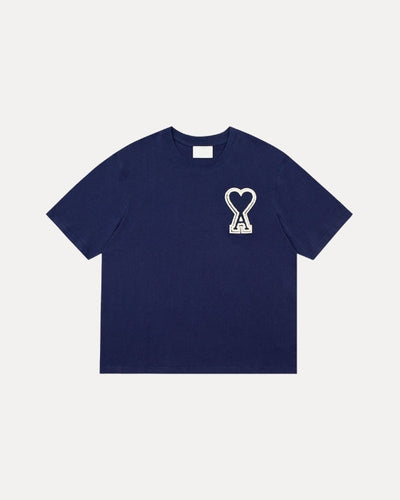 T-SHIRT DÉTAIL SUR LA POITRINE