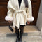 Manteau en laine avec fourrure