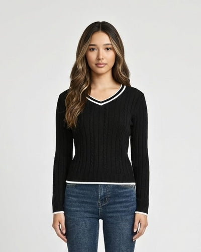 Pull en tricot torsadé