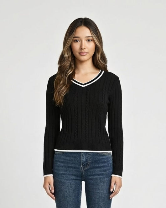 Pull en tricot torsadé